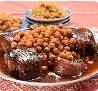 Pieds de veau aux pois chiches et raisins